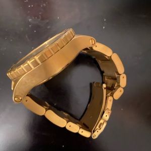 Gold Nixon watch men’s 51mm